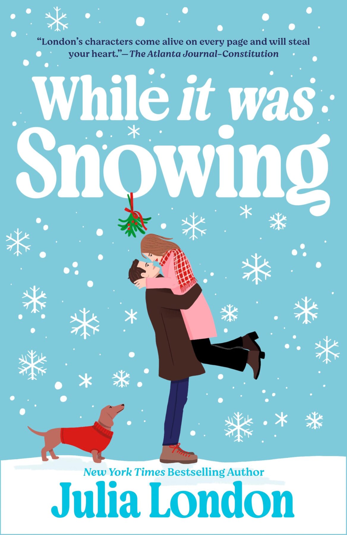 While It Was Snowing by Julia London book cover